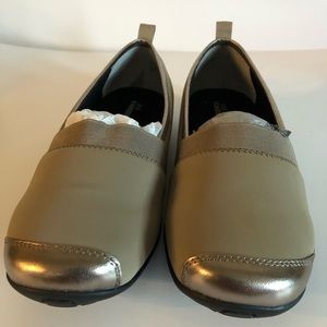 Brand New Beige and Silver Ros Hommerson Flats. Pets and Smoke Free.